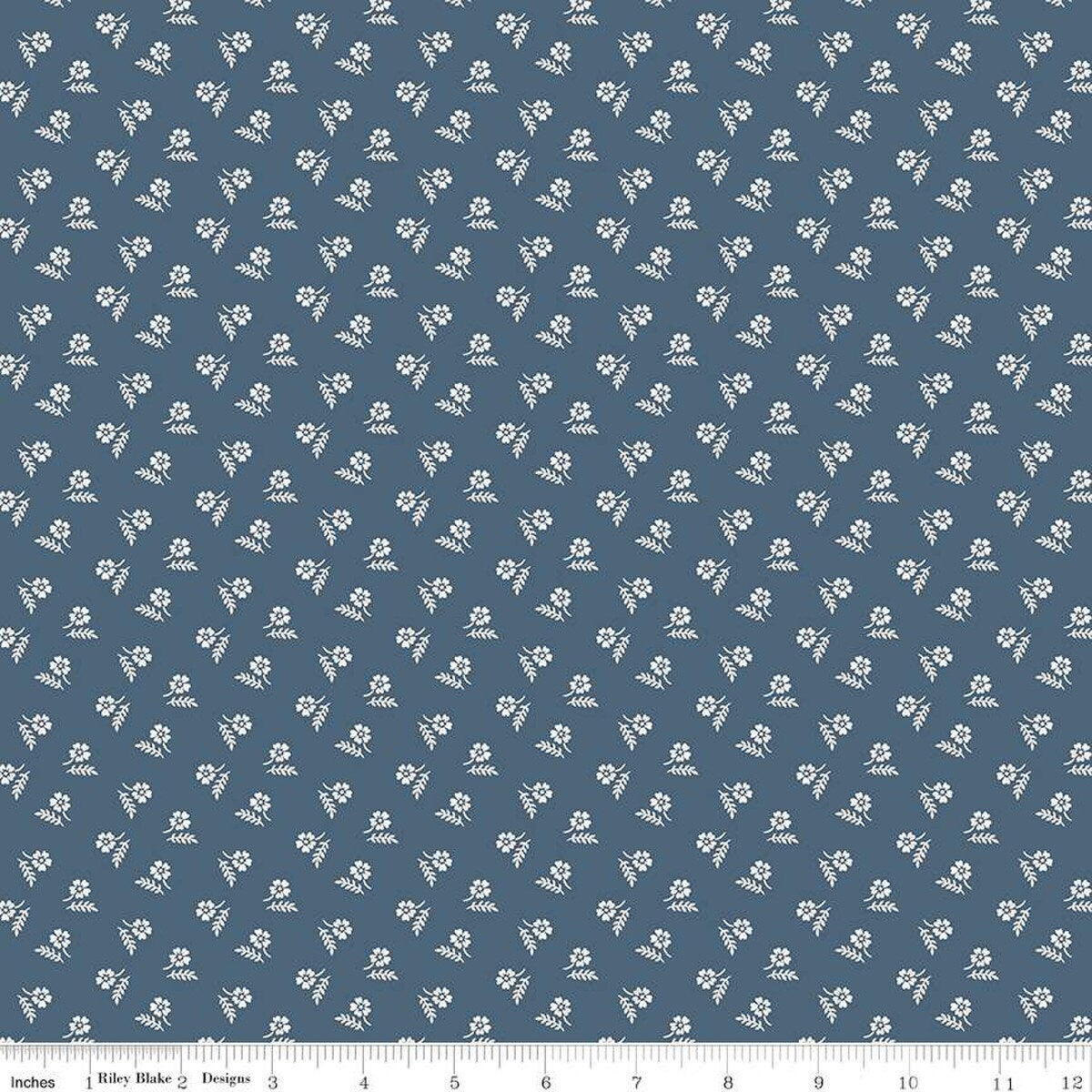 Image of the Serenity Blues Tiny Floral Navy quilting cotton fabric by Gerri Robinson for Riley Blake Designs. Features scattered blossoms and sprigs of leaves on a dark blue background. 
Cute Little Fabric Shop