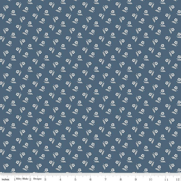 Image of the Serenity Blues Tiny Floral Navy quilting cotton fabric by Gerri Robinson for Riley Blake Designs. Features scattered blossoms and sprigs of leaves on a dark blue background. 
Cute Little Fabric Shop