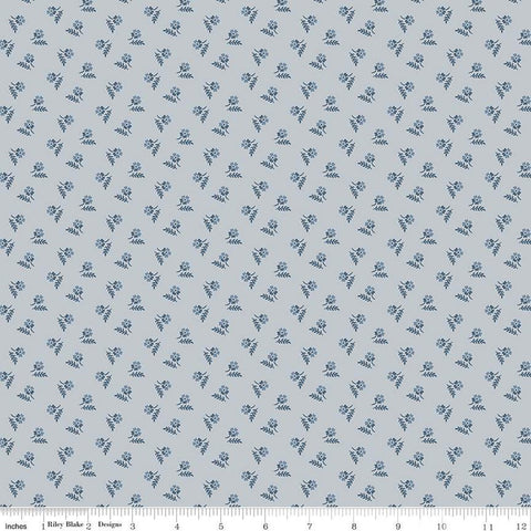 Image of the Serenity Blues Tiny Floral Gray quilting cotton fabric by Gerri Robinson for Riley Blake Designs. Features scattered blossoms and sprigs of leaves on a light gray background. 
Cute Little Fabric Shop