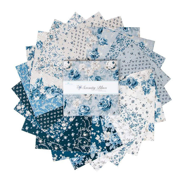 Image of the Serenity Blues 10 inch stacker by Gerri Robinson for Riley Blake Designs. Pictures the main grey fabric with large blue and white roses on a grey background. 
Cute Little Fabric Shop