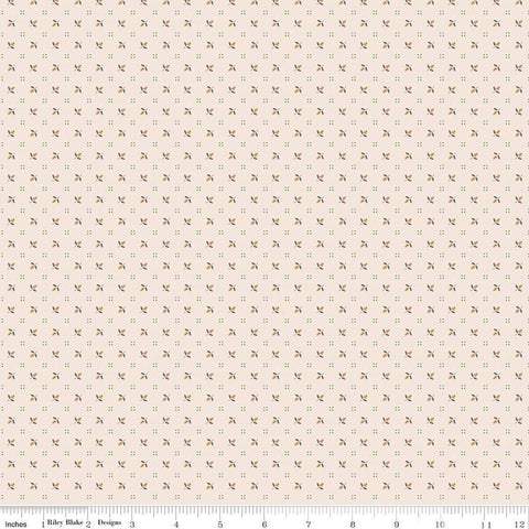 Image of the Home Town Holiday Flowerbud Latte quilting cotton fabric by Riley Blake Designs. Features an array of flowers and dotted squares on a cream pink beige background. 
Cute Little Fabric Shop