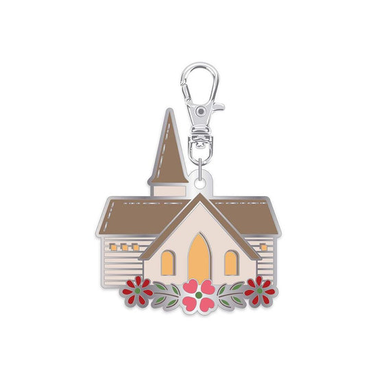 Image of the Lori Holt Enamel Happy Charm™ Chapel by Riley Blake Designs. Features a chapel with red an pink flowers in the front. 
Cute Little Fabric Shop