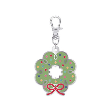 Image of the Lori Holt Enamel Happy Charm™ Wreath by Riley Blake Designs. Features a green wreath with colorful dots and a red bow. 
Cute Little Fabric Shop