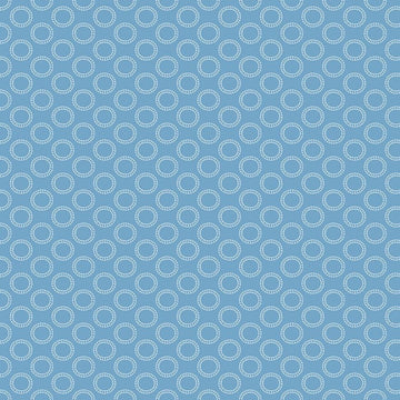 Image of the Thomas & Friends™ Sodor Railway Round the Track Blue quilting cotton fabric by Riley Blake Designs. Features circular tracks on a blue background. 
Cute Little Fabric Shop