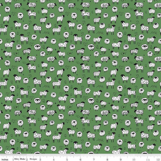 Image of the Farm Livin Sheep Green quilting cotton fabric by Riley Blake Designs. Features scattered sheep on a green background. 
Cute Little Fabric Shop