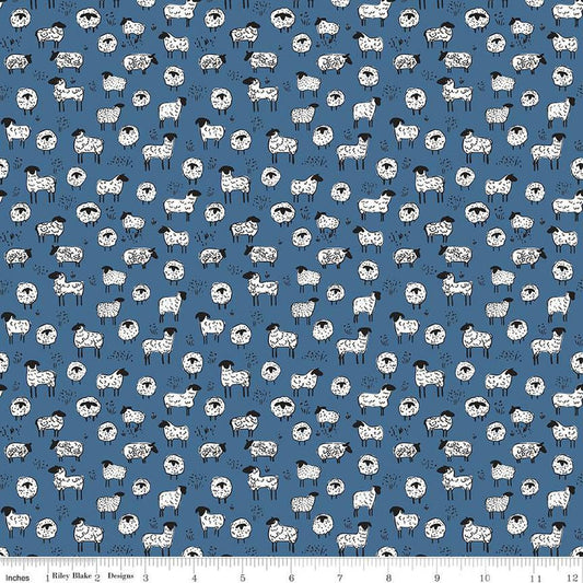 Image of the Farm Livin Sheep Denim quilting cotton fabric by Riley Blake Designs. Features scattered sheep on a blue background. 
Cute Little Fabric Shop