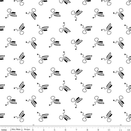 Image of the Press On Mini Irons Black quilting cotton fabric by J. Wecker Frisch for Riley Blake Designs. Features scattered mini irons on a white background. 
Cute Little Fabric Shop