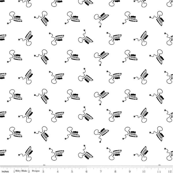 Image of the Press On Mini Irons Black quilting cotton fabric by J. Wecker Frisch for Riley Blake Designs. Features scattered mini irons on a white background. 
Cute Little Fabric Shop