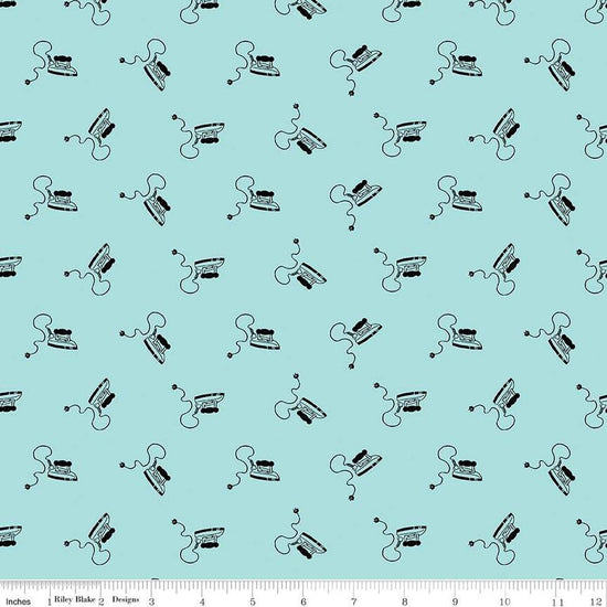 Image of the Press On Mini Irons Aqua quilting cotton fabric by J. Wecker Frisch for Riley Blake Designs. Features scattered mini irons on a aqua background. 
Cute Little Fabric Shop