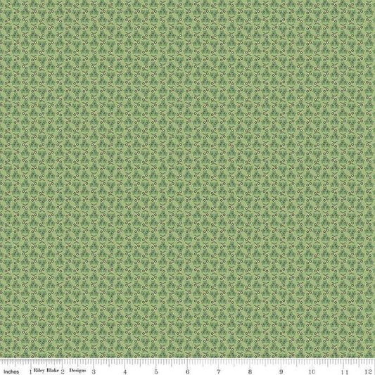 Image of the Home Town Holiday Ivy Lettuce by Riley Blake Designs. Features geometric design with holly leaves and berries on a green background
Cute Little Fabric Shop