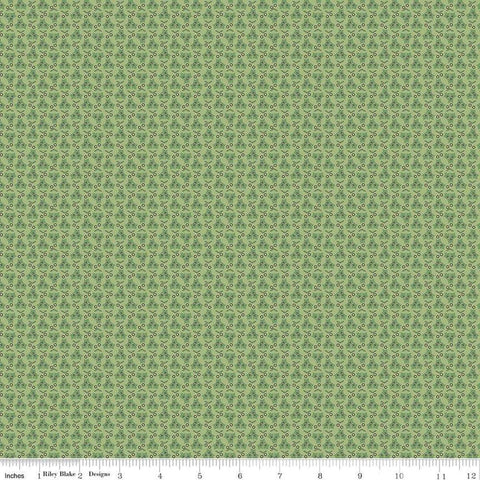 Image of the Home Town Holiday Ivy Lettuce by Riley Blake Designs. Features geometric design with holly leaves and berries on a green background
Cute Little Fabric Shop