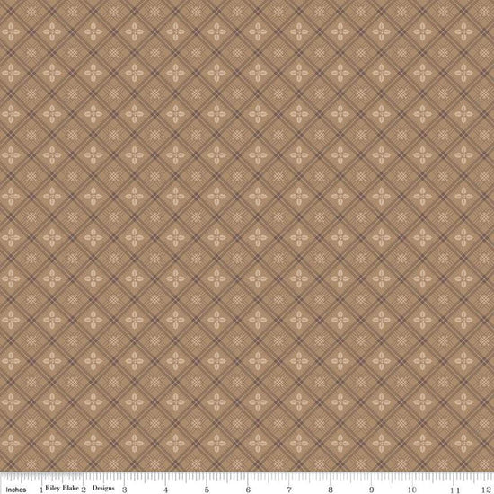 Image of the Home Town Holiday Holly Brown Sugar quilting cotton fabric by Riley Blake Designs. Features diagonal plaid with holly leaves on a beige brown background
Cute Little Fabric Shop