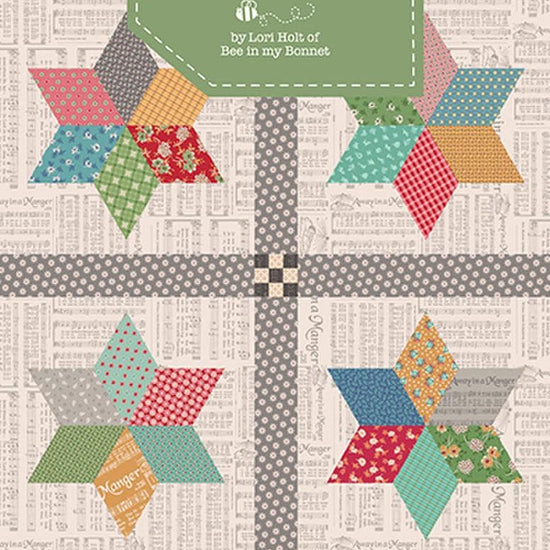 Image of the Home Town Star quilt pattern by Lori Holt for Riley Blake Designs. Features stars on alight background. 
Cute Little Fabric Shop