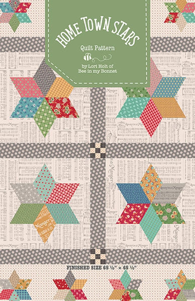 Image of the Home Town Star quilt pattern by Lori Holt for Riley Blake Designs. Features stars on alight background. 
Cute Little Fabric Shop