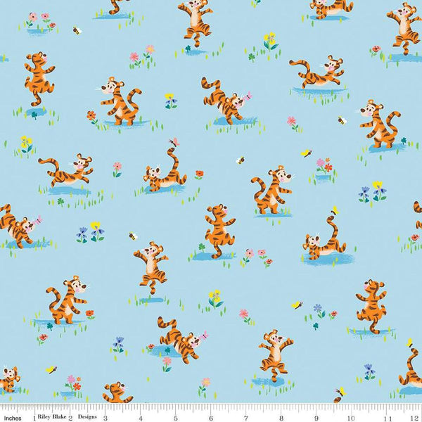 Image of the 100 Aker Woods Tigger Bounce Sky quilting cotton fabric by Jill Howarth for Riley Blake Designs. Features Tigger bouncing around flowers on a blue background.
Cute Little Fabric Shop