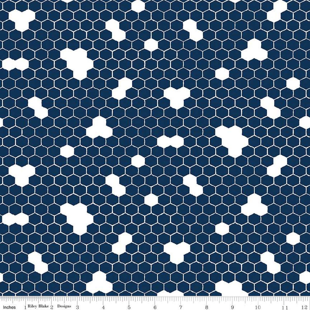Image of the Honey Bees and Flowers Please Honeycomb Navy quilting cotton fabric by Tara Reed for Riley Blake Designs. Features honeycomb hexagons on a navy background. 
Cute Little Fabric Shop