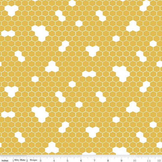 Image of the Honey Bees and Flowers Please Honeycomb Gold quilting cotton fabric by Tara Reed for Riley Blake Designs. Features honeycomb hexagons on a yellow background. 
Cute Little Fabric Shop