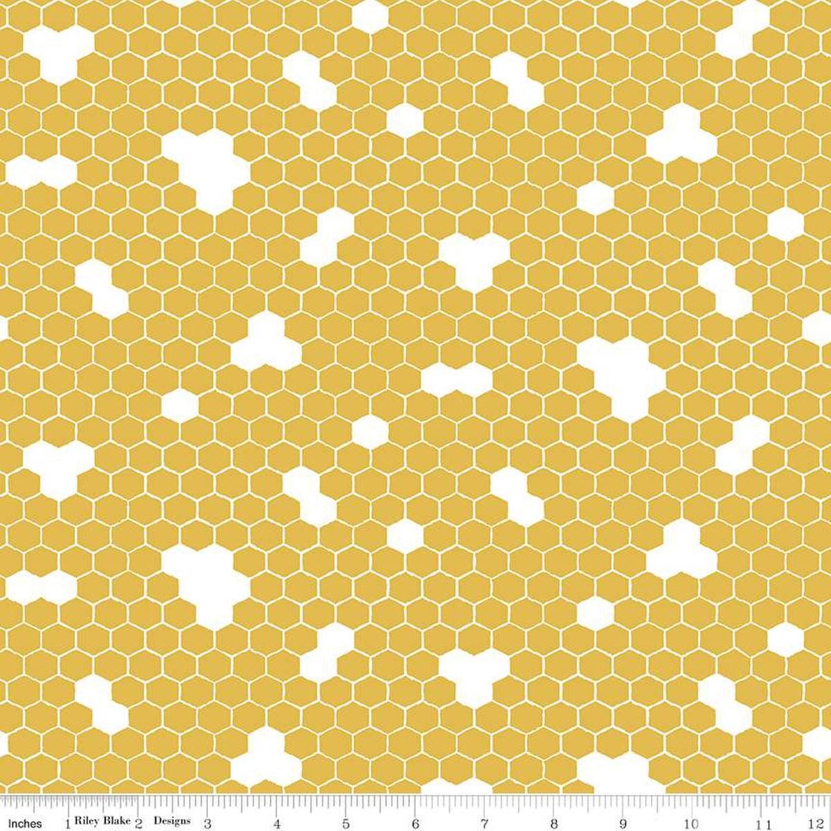 Image of the Honey Bees and Flowers Please Honeycomb Gold quilting cotton fabric by Tara Reed for Riley Blake Designs. Features honeycomb hexagons on a yellow background. 
Cute Little Fabric Shop
