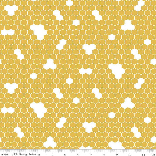 Image of the Honey Bees and Flowers Please Honeycomb Gold quilting cotton fabric by Tara Reed for Riley Blake Designs. Features honeycomb hexagons on a yellow background. 
Cute Little Fabric Shop