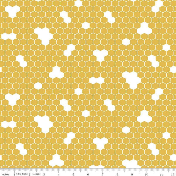 Image of the Honey Bees and Flowers Please Honeycomb Gold quilting cotton fabric by Tara Reed for Riley Blake Designs. Features honeycomb hexagons on a yellow background. 
Cute Little Fabric Shop