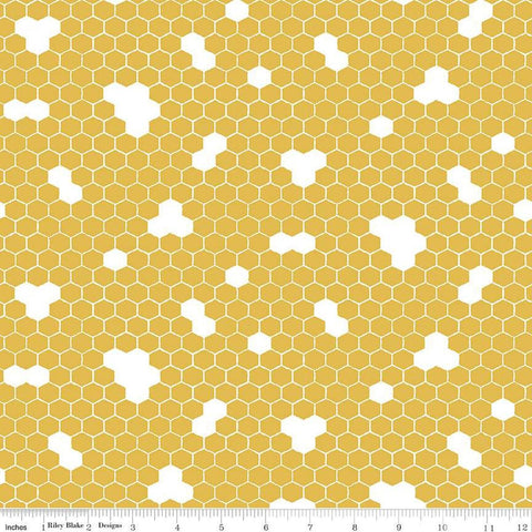 Image of the Honey Bees and Flowers Please Honeycomb Gold quilting cotton fabric by Tara Reed for Riley Blake Designs. Features honeycomb hexagons on a yellow background. 
Cute Little Fabric Shop