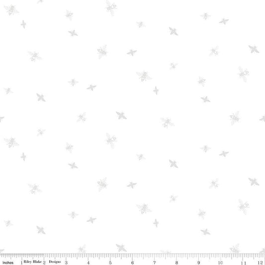 Image of the Honey Bees and Flowers Please Bees White on white quilting cotton fabric by Tara Reed for Riley Blake Designs. Features small bees scattered on a white background. 
Cute Little Fabric Shop