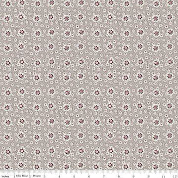 Image of the Mansfield Park Yates quilting cotton fabric by Riley Blake Designs. Features small flowers scattered on a tan background. 
Cute Little Fabric Shop