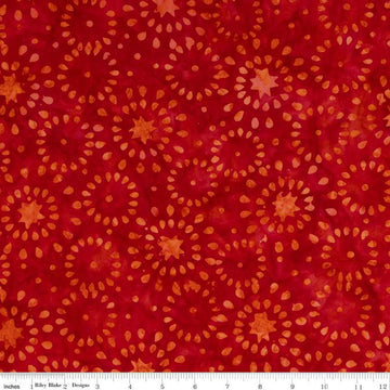 Image of the Expressions Batiks Elementals Tomato 1 fabric by Riley Blake Designs. Features tomato circle patterns on a red background. 
Cute Little Fabric Shop