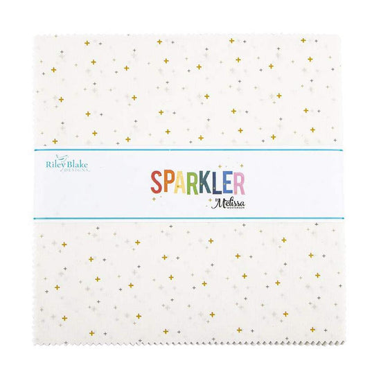Image of the Sparkler 10" White Stacker by Melissa Mortenson for Riley Blake Designs. Features small gold crosses on a white background. 
Cute Little Fabric Shop