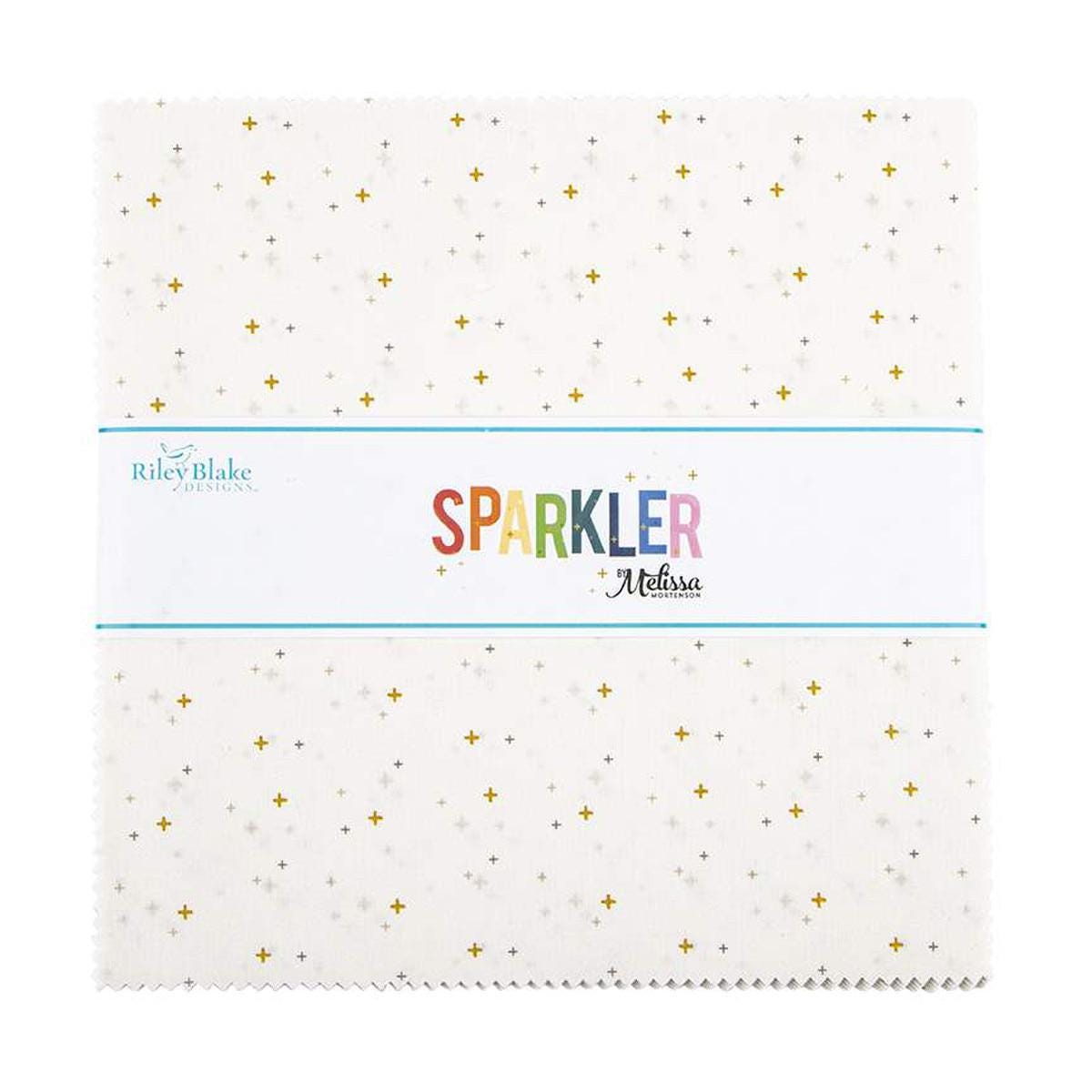 Image of the Sparkler 10" White Stacker by Melissa Mortenson for Riley Blake Designs. Features small gold crosses on a white background. 
Cute Little Fabric Shop