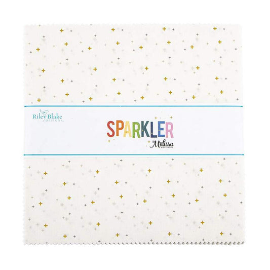 Image of the Sparkler 10" White Stacker by Melissa Mortenson for Riley Blake Designs. Features small gold crosses on a white background. 
Cute Little Fabric Shop