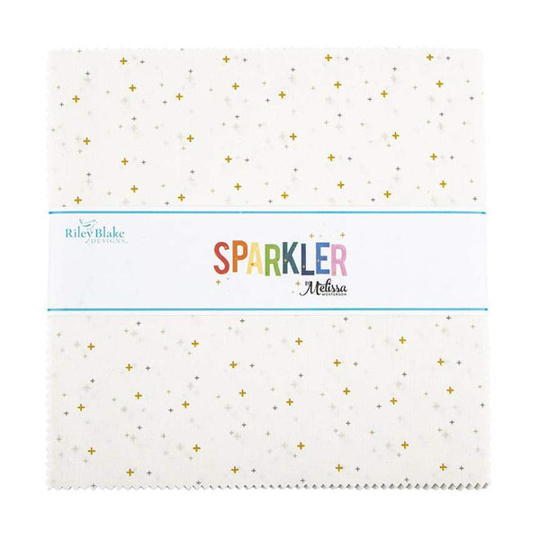 Image of the Sparkler 10&quot; White Stacker by Melissa Mortenson for Riley Blake Designs. Features small gold crosses on a white background. 
Cute Little Fabric Shop