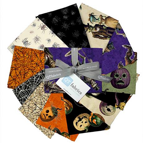 Image of the Creepsville 13 piece fat quarter bundle. Features halloween fabrics with green, black, cream, and orange backgrounds. 
Cute Little Fabric Shop