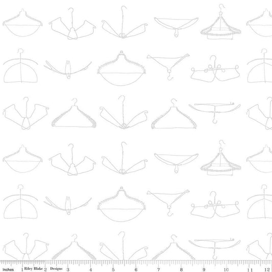 Image of the Press On Wire Hangers White quilting cotton fabric by J. Wecker Frisch for Riley Blake Designs. Features scattered wire clothes hangers on a white background. 
Cute Little Fabric Shop