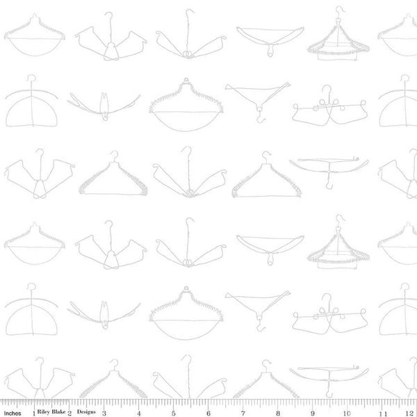 Image of the Press On Wire Hangers White quilting cotton fabric by J. Wecker Frisch for Riley Blake Designs. Features scattered wire clothes hangers on a white background. 
Cute Little Fabric Shop