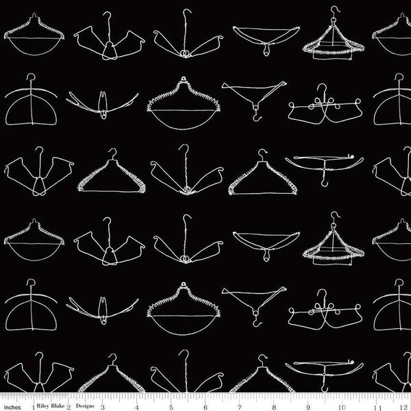 Image of the Press On Wire Hangers Black quilting cotton fabric by J. Wecker Frisch for Riley Blake Designs. Features scattered wire clothes hangers on a black background. 
Cute Little Fabric Shop