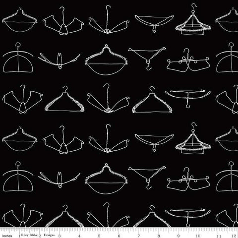 Image of the Press On Wire Hangers Black quilting cotton fabric by J. Wecker Frisch for Riley Blake Designs. Features scattered wire clothes hangers on a black background. 
Cute Little Fabric Shop