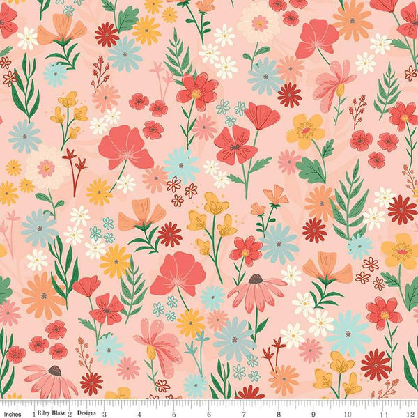 Image of the Stay Wild Main Peaches &#39;n Cream quilting cotton fabric by Amanda Niederhauser by Riley Blake Designs. Features wildflowers on a light pink background. 
Cute Little Fabric Shop