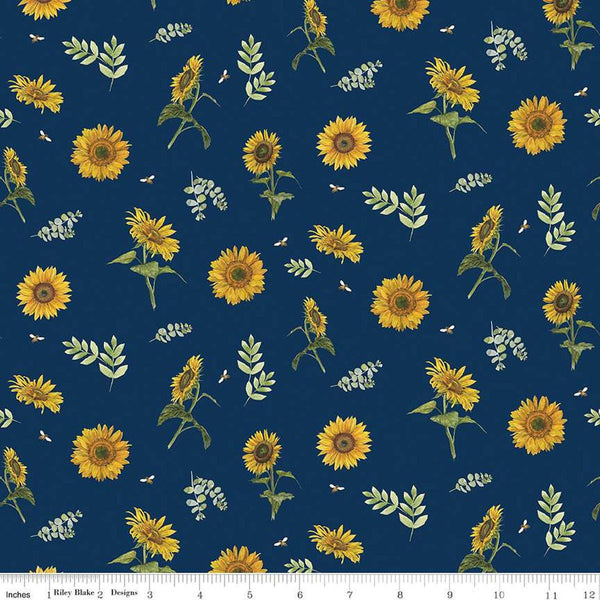Image of the Honey Bees and Flowers Please Sunflowers and Bees Navy quilting cotton fabric by Tara Reed for Riley Blake Designs. Features sunflowers, bees, and sprigs of leaves on a navy blue background. 
Cute Little Fabric Shop