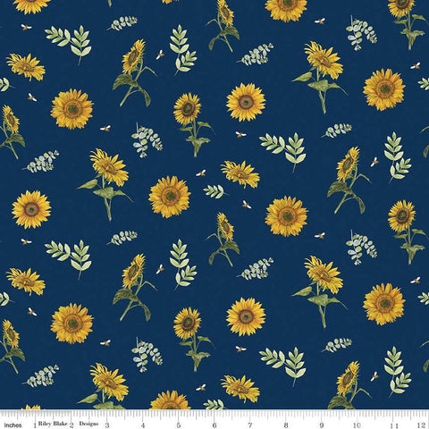 Image of the Honey Bees and Flowers Please Sunflowers and Bees Navy quilting cotton fabric by Tara Reed for Riley Blake Designs. Features sunflowers, bees, and sprigs of leaves on a navy blue background. 
Cute Little Fabric Shop