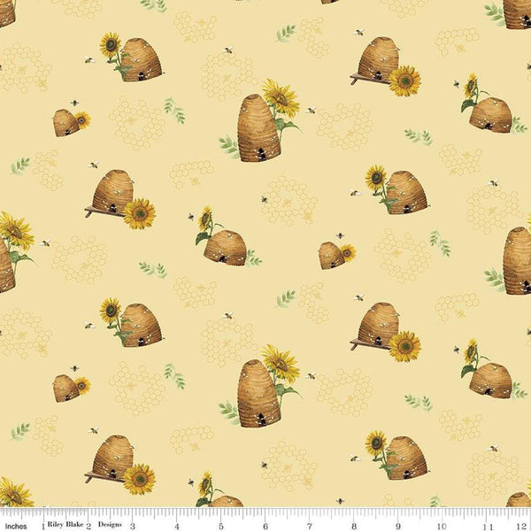 Image of the Honey Bees and Flowers Please Beehives Yellow quilting cotton fabric by Tara Reed for Riley Blake Designs. Features  beehives, bees, honeycomb, and sunflowers on a yellow background. 
Cute Little Fabric Shop