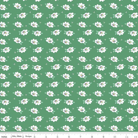 Image of the Always in Season Daisy Green quilting cotton fabric by American Jane for Riley Blake Designs. Features scattered blossoms and dots on a green background. 
Cute Little Fabric Shop