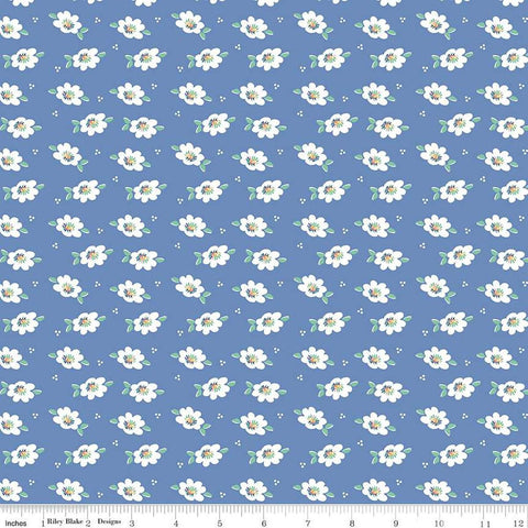 Image of the Always in Season Daisy Blueberry quilting cotton fabric by American Jane for Riley Blake Designs. Features scattered blossoms and dots on a blue background. 
Cute Little Fabric Shop