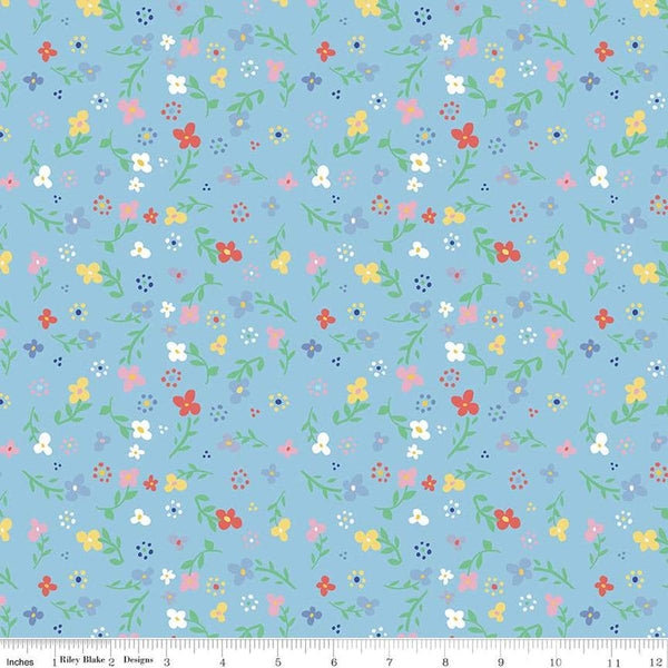 Image of the Always in Season Small Floral Sky quilting cotton fabric by American Jane for Riley Blake Designs. Features scattered blossoms on a light blue background. 
Cute Little Fabric Shop