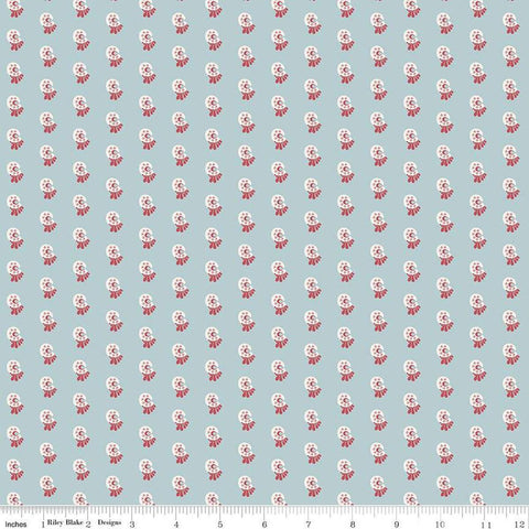 Image of the Mansfield Park Price quilting cotton fabric by Riley Blake Designs. Features  abstract shapes on a light blue background. 
Cute Little Fabric Shop