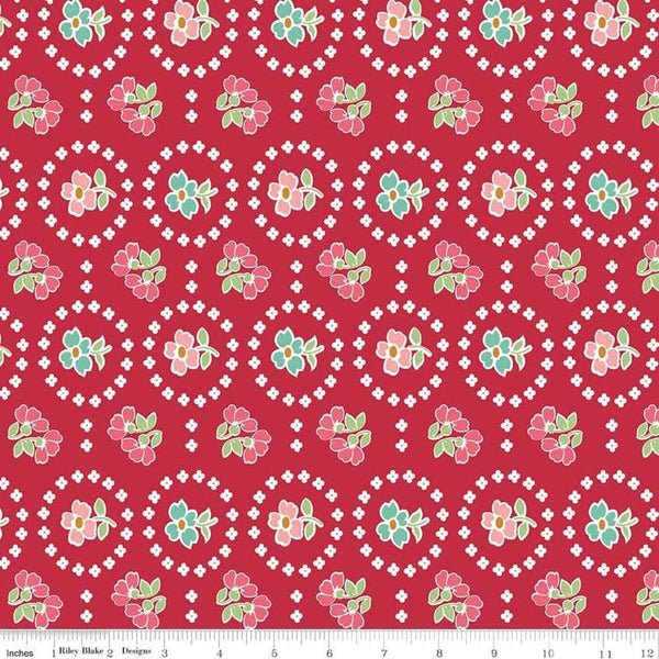 Image of the Granny Chic Curtains Red quilting cotton fabric by Lori Holt for Riley Blake Designs. Features a flower bordered by a circle of small white flowers on a red background. 
Cute Little Fabric Shop