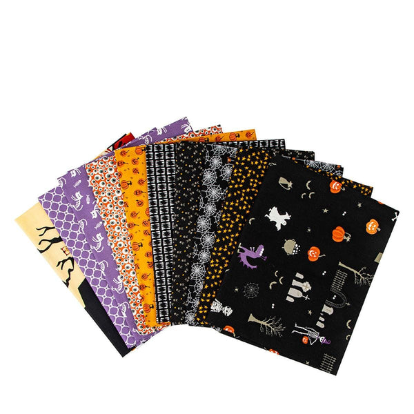 Image of the Beggar&#39;s Night 1 yard bundle black by Sandy Gervais for Riley Blake Designs. Features halloween themed fabrics on black, orange, and purple. 
Cute Little Fabric Shop