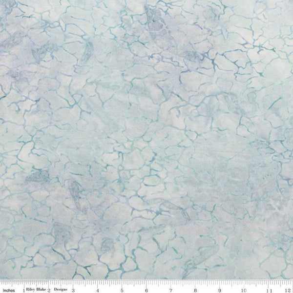 Image of the Expressions Batiks Breathe Ice Blue Batik fabric by Riley Blake Designs. Features an icy blue fabric with cracks and fracture patterns. 
Cute Little Fabric Shop