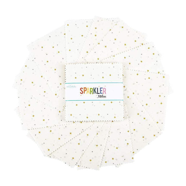 Image of the Sparkler 5&quot; White Stacker by Melissa Mortenson by Riley Blake Designs. Features little crosses on white backgrounds. 
Cute Little Fabric Shop