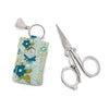 Image of the Leather Scissor Pouch Feed My Soul by Sandy Gervais for Riley Blake Designs. Features a blue case with flowers on it. 
Cute Little Fabric Shop